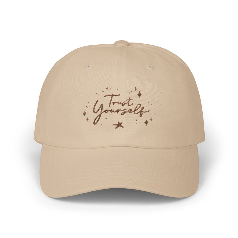 Embrace your personal growth with the 'Trust Yourself' dad cap in stone color. Featuring a simple, powerful embroidered message, this cap inspires confidence and resilience. A great addition for those who appreciate uplifting, daily reminders of strength. PicaBright