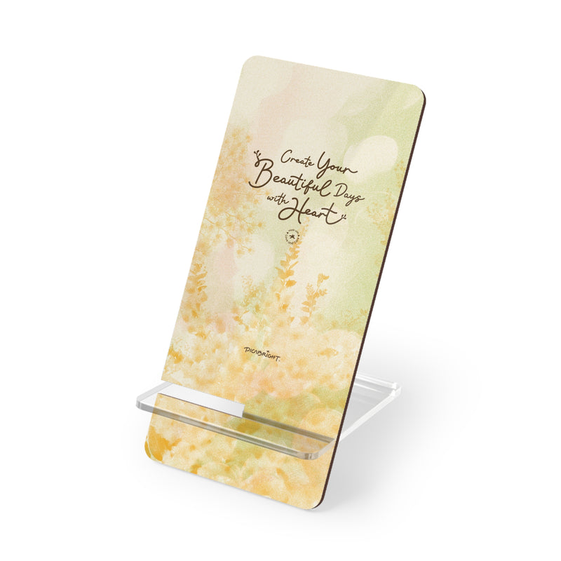 Display your phone in style with the 'Your Beautiful Days' display stand, featuring a cheerful orange floral wonderland design. A great way to stay organized while bringing positive energy into your work and home space. PicaBright