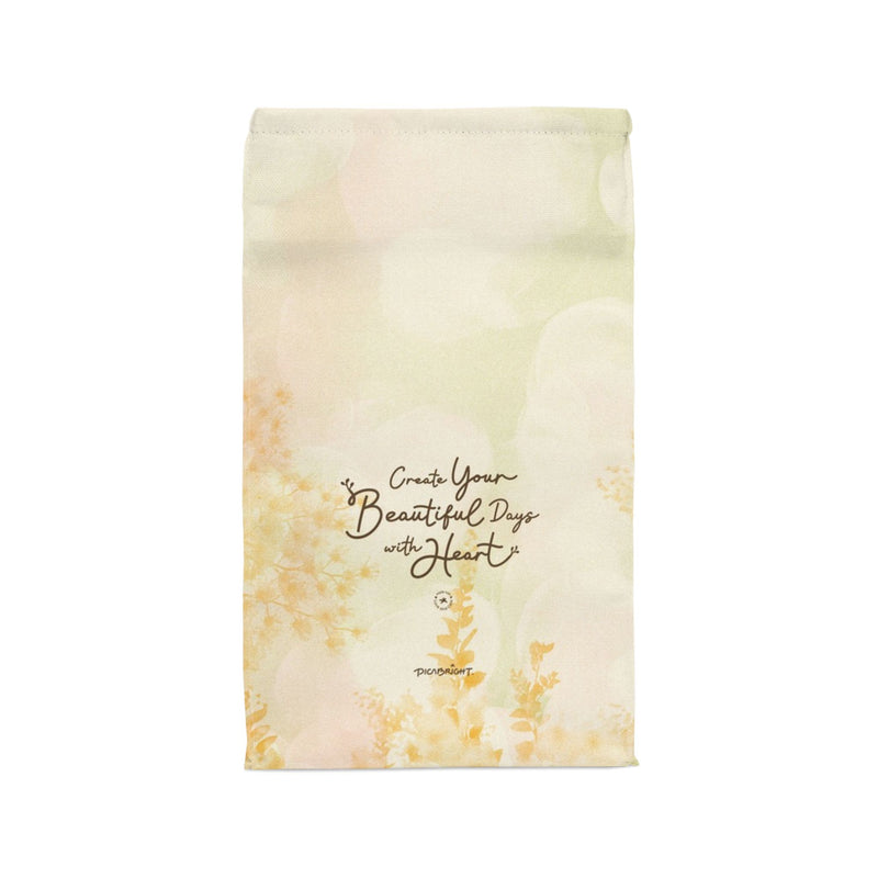 Keep your meals fresh with the 'Your Beautiful Days' lunch bag, designed with a tranquil orange floral wonderland theme. An eco-friendly, practical choice for those seeking balance and peace throughout the day. PicaBright