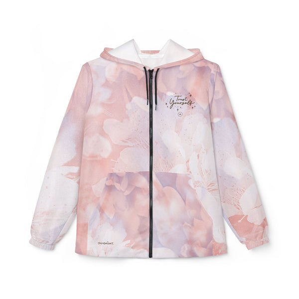 The 'Trust Yourself' windbreaker jacket, featuring a calming pink blossom floral design, provides lightweight protection and serves as a source of motivation for your wellness journey. Perfect for those seeking comfort, style, and daily encouragement to embrace self-care and confidence. This jacket offers a gentle reminder to trust your strength, making it an ideal choice for individuals prioritizing mental well-being and personal growth. PicaBright