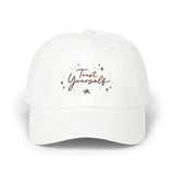 Stay motivated every day with the 'Trust Yourself' dad cap in white. With bold embroidered text, this cap serves as a positive affirmation, helping wearers overcome doubts and stay focused on their goals. A thoughtful gift for those needing encouragement. PicaBright